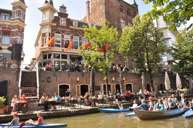 The Utrecht canals on a sunny day are packed with boats