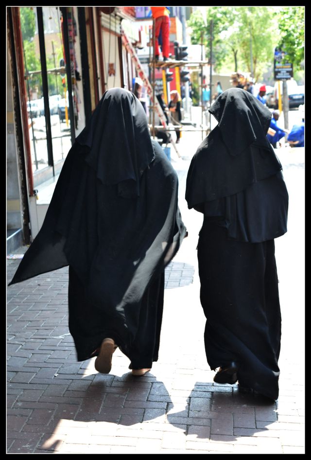 two women in black